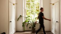 Walking between two doors. 